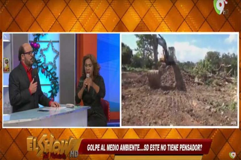 Colmado la Costumbre: El Cañero con retro escarbadora cerca del faro a colon