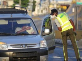 Transportista detenido en toque de queda